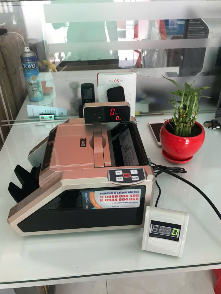 Địa chỉ cung cấp máy đếm tiền chính hãng